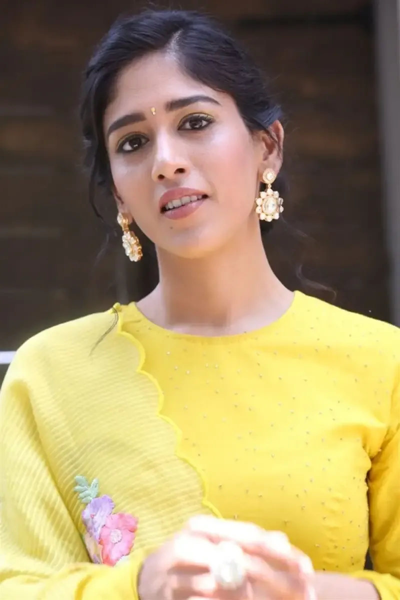ACTRESS CHANDINI CHOWDARY IN YELLOW DRESS AT MOVIE TEASER LAUNCH 4